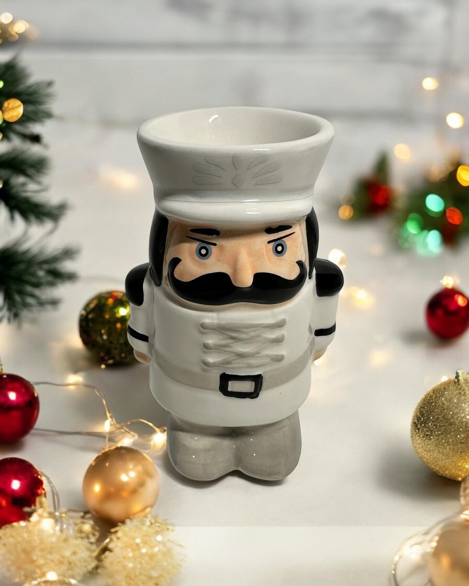 Christmas nutcracker ceramic wax melt burner, festive design for cosy home fragrance during the holidays.