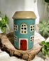 Aqua country house ceramic wax melt burner, adding rustic charm and inviting scents to your home decor.