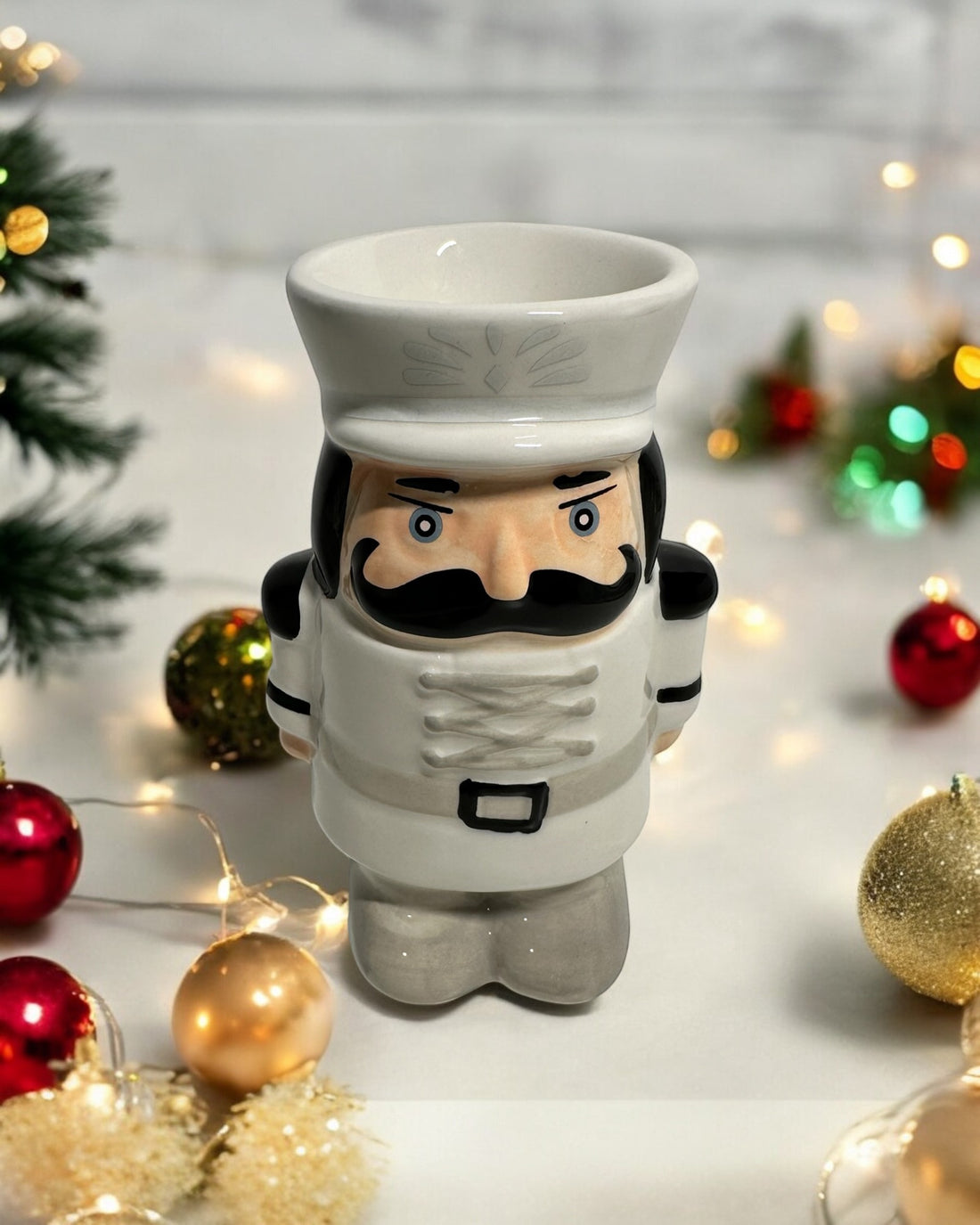 Christmas nutcracker ceramic wax melt burner, festive design for cosy home fragrance during the holidays.