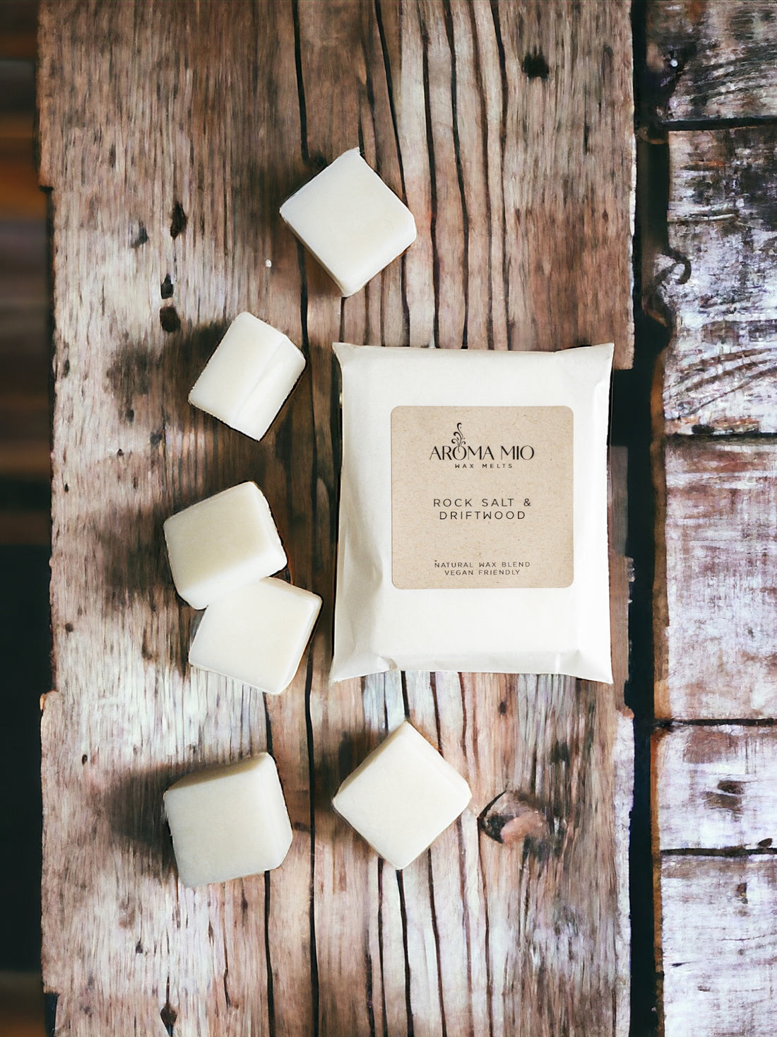 Rock Salt &amp; Driftwood Wax Melts, featuring a fresh blend of oceanic rock salt and earthy driftwood scents. Ideal for infusing your home with a clean, coastal aroma that creates a serene and inviting atmosphere. Perfect for a sophisticated and refreshing fragrance experience.