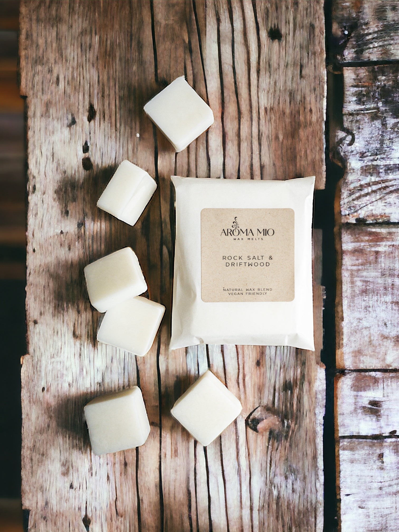 Rock Salt &amp; Driftwood Wax Melts, featuring a fresh blend of oceanic rock salt and earthy driftwood scents. Ideal for infusing your home with a clean, coastal aroma that creates a serene and inviting atmosphere. Perfect for a sophisticated and refreshing fragrance experience.