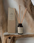 Rocksalt & Driftwood Reed Diffuser, featuring a refreshing blend of coastal scents. Combines rocksalt and driftwood notes to enhance your home with a clean, oceanic fragrance, perfect for creating a serene and inviting atmosphere.